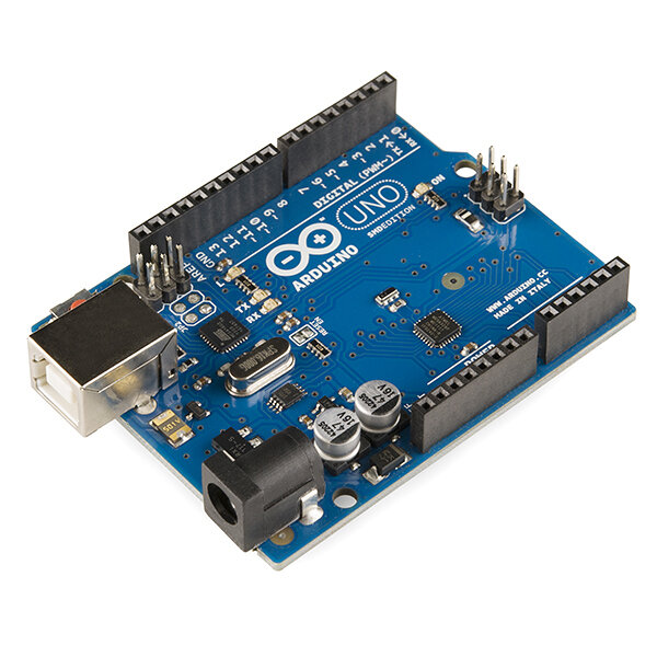 `Arduino Uno` z 8-bitowym mikrokontrolerem `ATmega328P` (`16 MHz`). To standard prototypowania prostej elektroniki, ale jego zegar i architektura wykluczają deterministyczne przełączanie pinów co kilka nanosekund. Zdjęcie: Wikimedia Commons, *Arduino Uno - R3*